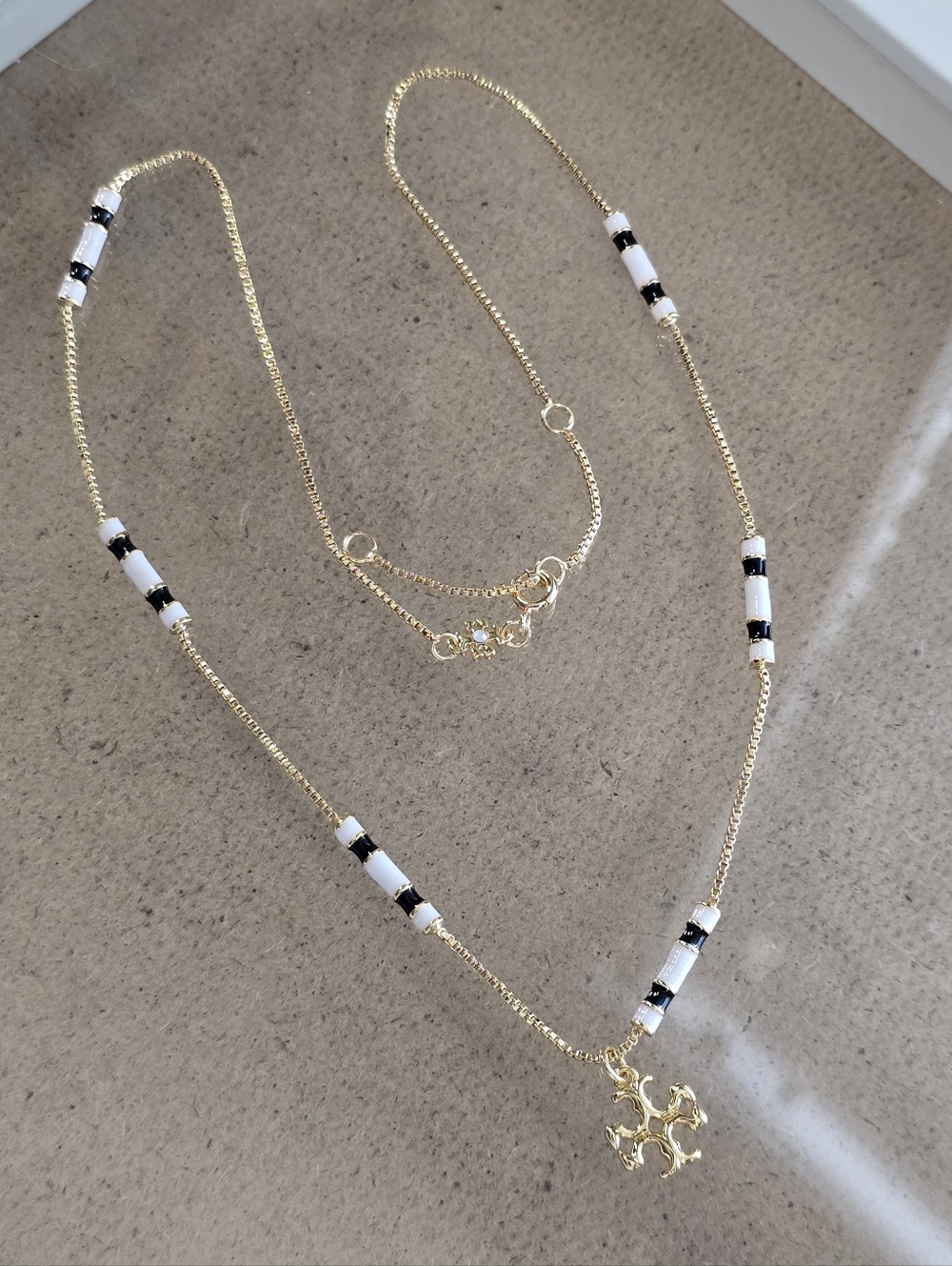 Tory BURCH Gold Plated Necklace with White and Black Bead Accents
